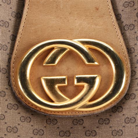 gucci canvas bag history.